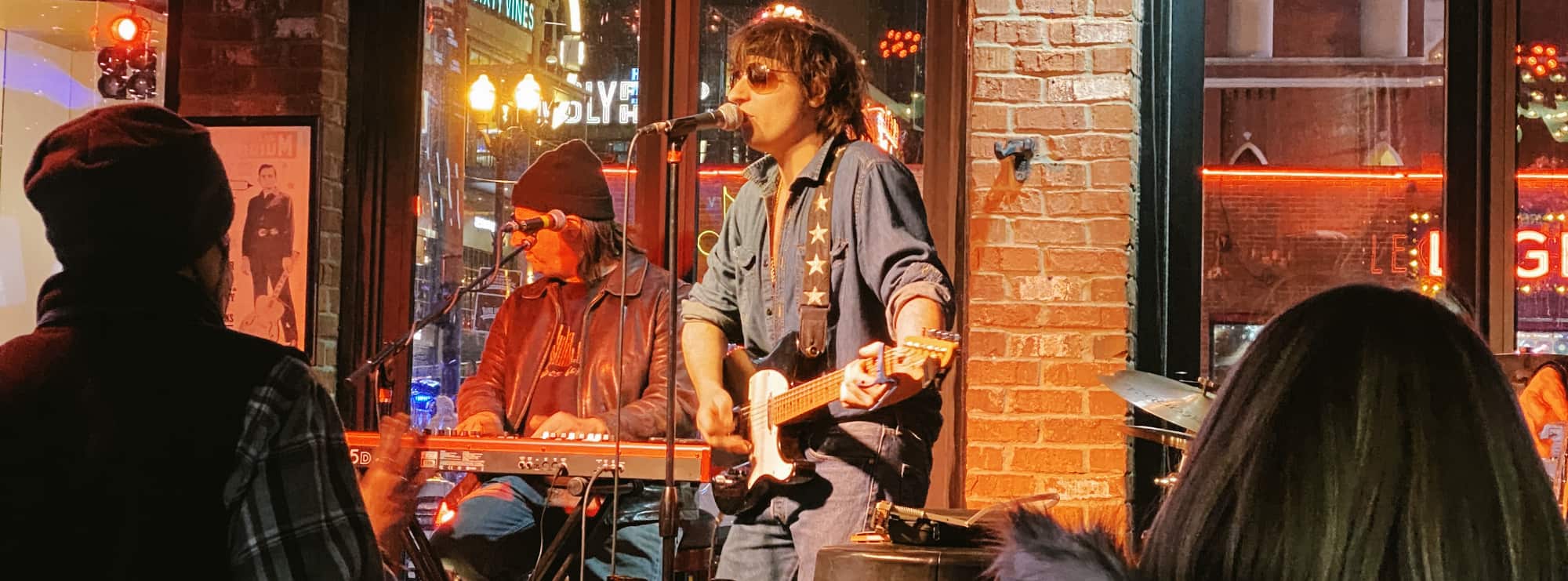 bar singer on guitar in Gainesville