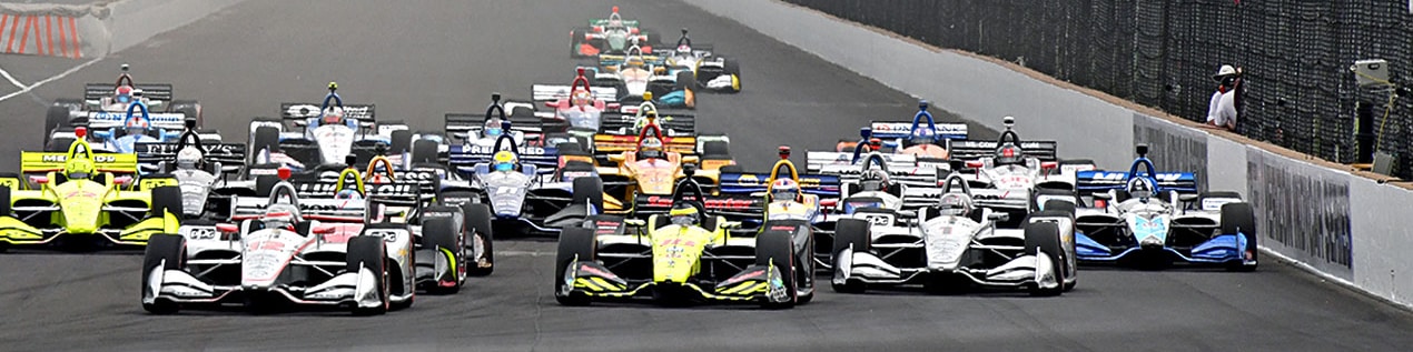 indy cars racing to through the start line Gainesville
